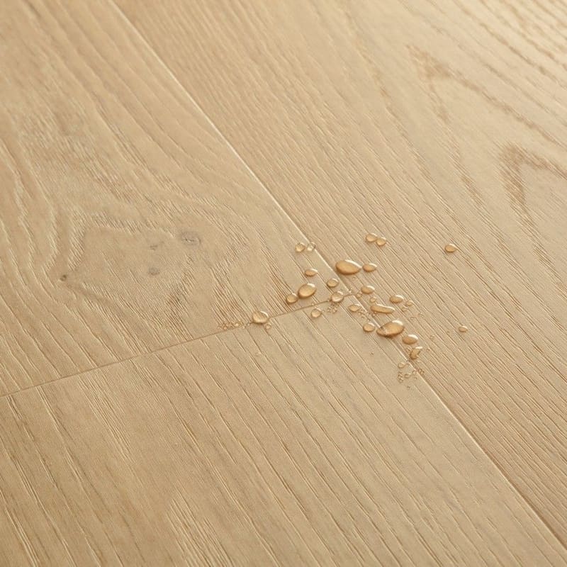 Full room view of Coast Oak Beige flooring installed in a modern living space with natural light