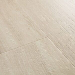 Quick-Step Canyon Oak Beige flooring in a modern kitchen with family
