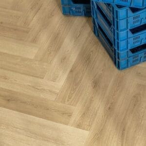 Quick-Step Alpha Ciro Botanic Beige Herringbone flooring in kitchen with blue crates