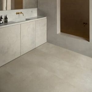 Attic bedroom with skylight and Sandstone Concrete flooring