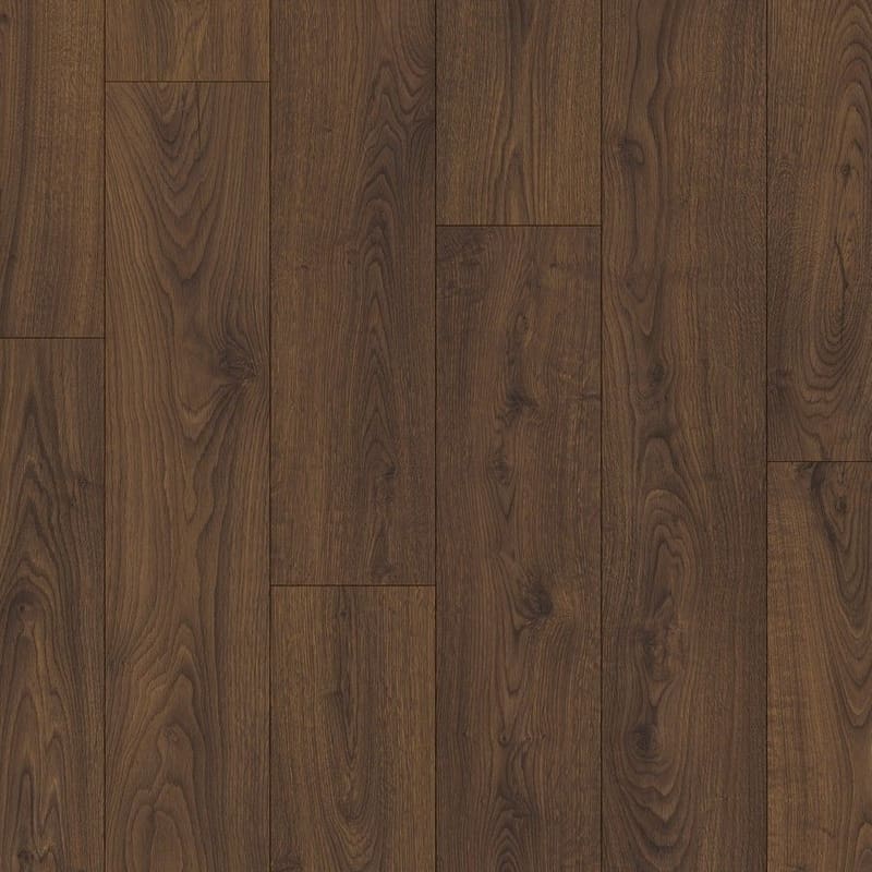 Quick-Step Classic Peanut Brown Oak laminate flooring sample showing rich wood grain pattern and texture