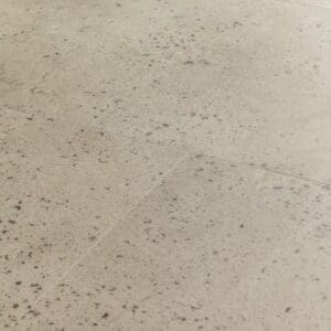Full tile view of Oyster Concrete flooring showing complete terrazzo pattern