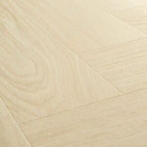 Detailed view of Quick-Step Alpha Ciro Pure Oak Polar flooring showing natural wood grain texture