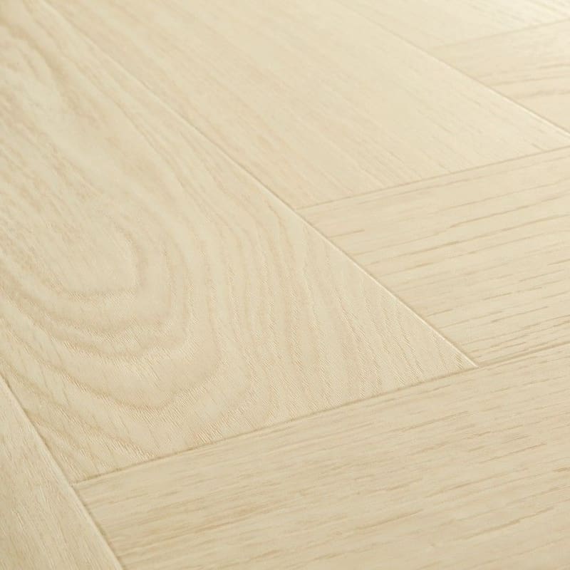 Detailed view of Quick-Step Alpha Ciro Pure Oak Polar flooring showing natural wood grain texture