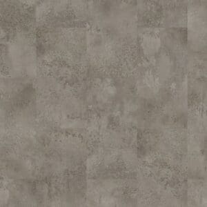 Moduleo Roots Meteora 46943 luxury vinyl flooring featuring a stone-effect design with subtle metallic finish in grey tones