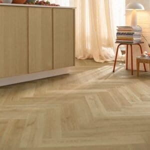 Quick-Step Alpha Ciro Botanic Beige Herringbone flooring in bright kitchen with strawberries