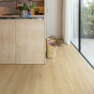 Bedroom with rustic wooden elements and Quick-Step Botanic Beige flooring