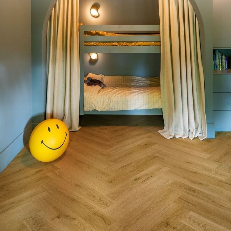 Living room with Quick-Step Alpha Ciro Botanic Smoked Oak flooring in herringbone pattern