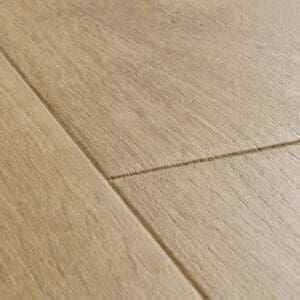 Full view of Quick-Step Impressive Soft Oak Medium laminate flooring showing plank pattern and natural oak coloration
