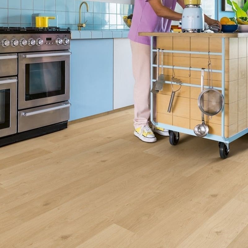 Kitchen with Coast Oak Beige flooring showing durability in high-traffic area