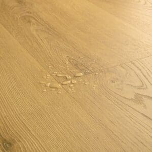 Full room view of Quick-Step Classic Light Classic Oak Laminate installed in a children's bedroom with playhouse