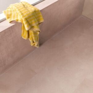 Bathtub surround featuring Soft Blush vinyl flooring in a spa-like bathroom