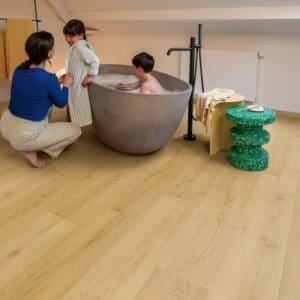 Full room installation of Quick-Step Alpha Bloom Brushed Oak Honey vinyl flooring