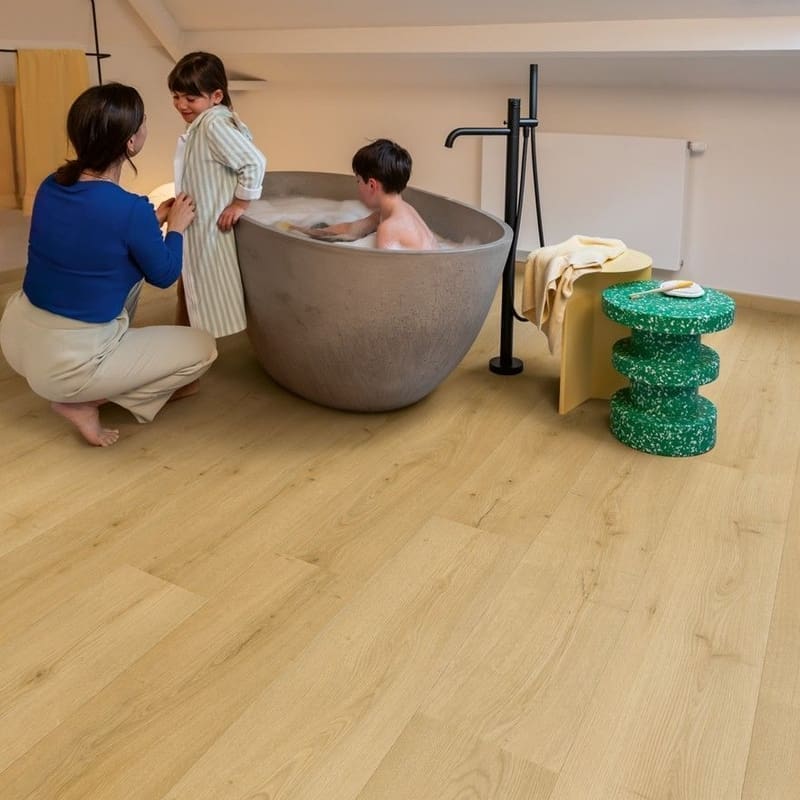 Full room installation of Quick-Step Alpha Bloom Brushed Oak Honey vinyl flooring