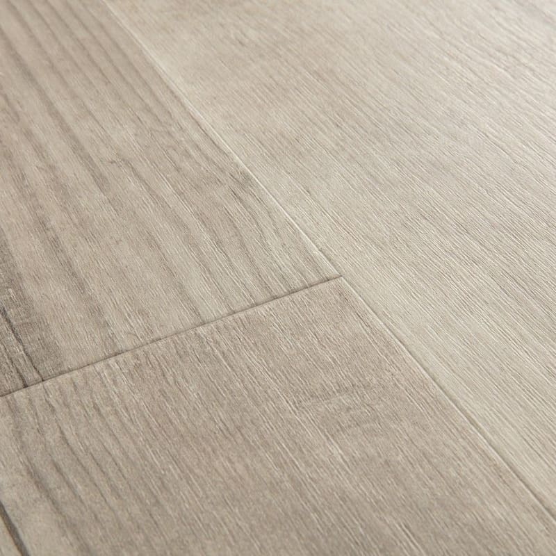 Close-up detail of Quick-Step Alpha Bloom Morning Mist Pine vinyl flooring showing wood grain texture