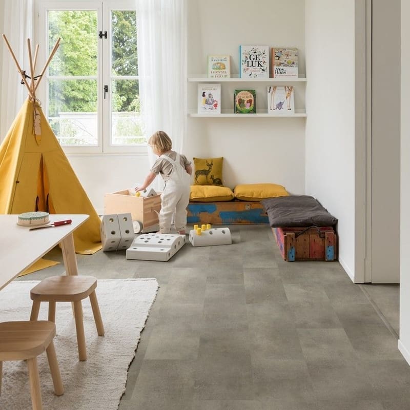 Home office with built-in desk and Quick-Step Alpha Oro Concrete Rock flooring