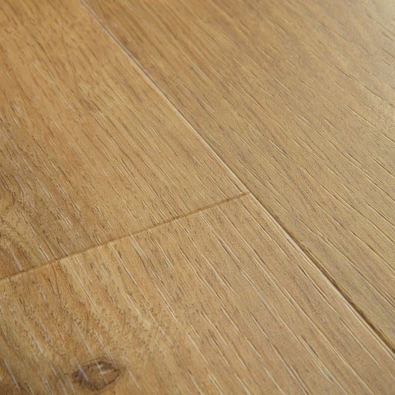 Detailed view of Quick-Step Alpha Blos Cottage Oak Natural flooring showing texture and plank joints