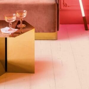 Detail of pink sofa on Painted Oak Rose laminate flooring