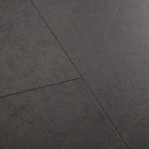 Close-up of Quick-Step Alpha Oro Black Slate vinyl flooring showing tile joints and surface texture