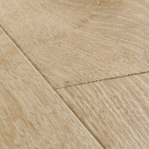 Full view of Quick-Step Impressive Ultra Classic Oak Beige laminate flooring showing plank pattern and natural oak appearance
