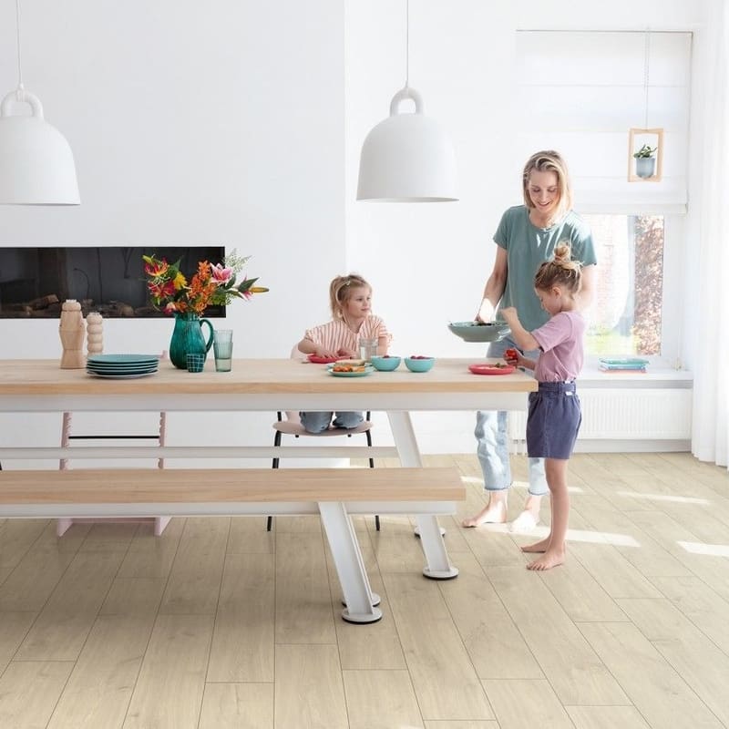 Family preparing food in dining area with Quick-Step Havana Oak Natural flooring