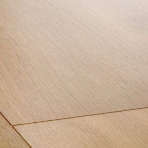 Close-up detail of Quick-Step Classic Midnight Oak Natural laminate flooring showing texture and plank joint