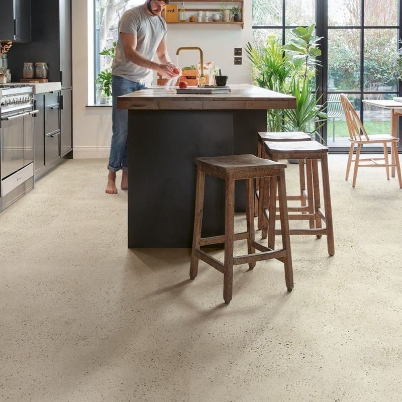Contemporary kitchen with wooden cabinetry and Quick-Step Pebble Concrete flooring