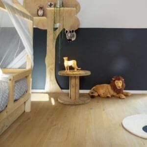 Children's bedroom with Cotton Oak Deep Natural flooring and wooden tree shelf