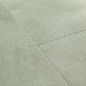 Detail of Soft Sage vinyl flooring showing water droplets demonstrating waterproof properties