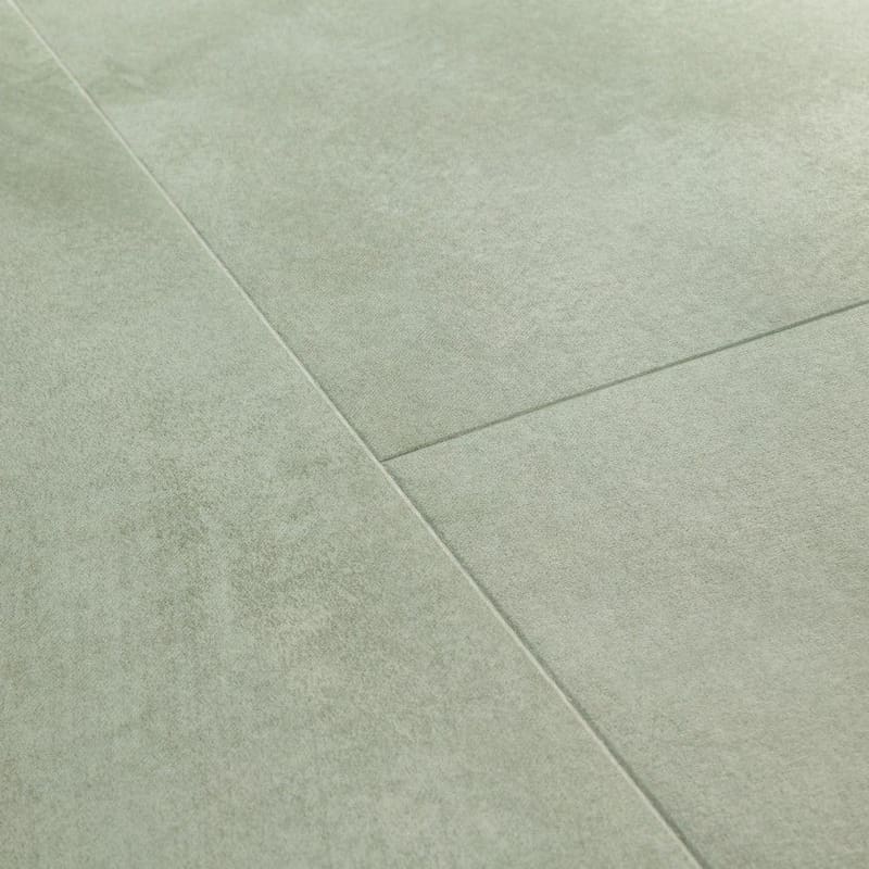 Detail of Soft Sage vinyl flooring showing water droplets demonstrating waterproof properties