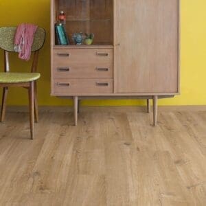 Mid-century cabinet against yellow wall with Cotton Oak Natural flooring