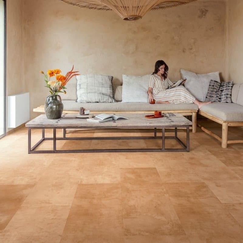 Quick-Step Muse Terracotta Laminate Flooring MUS5490 in a living room with person standing by window