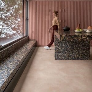 Modern kitchen with Soft Blush vinyl flooring and terrazzo countertops