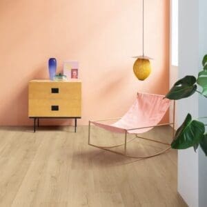 Close-up of Quick-Step Botanic Beige flooring showing detailed grain texture