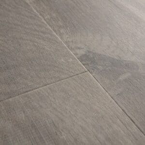 Close-up of Cotton Oak Cozy Grey flooring showing detailed wood grain texture and joints