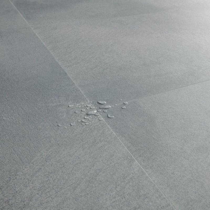 Quick-Step Soft Sky flooring installed in a modern living room with contemporary furniture