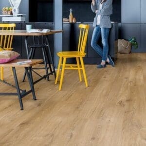 Modern kitchen with black cabinets and Cotton Oak Natural flooring