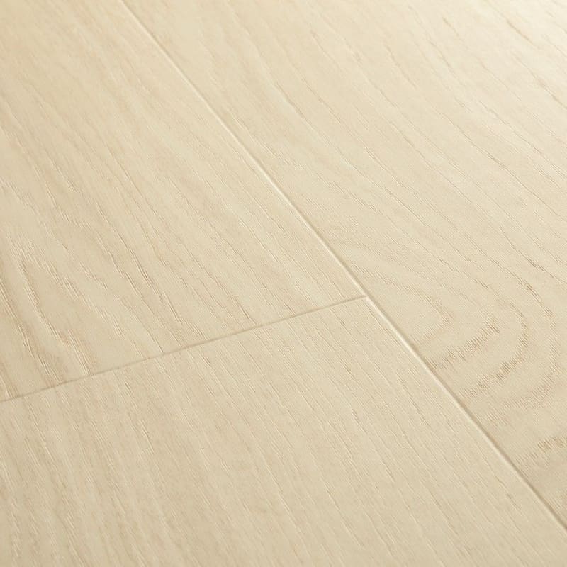 Close-up detail of Quick-Step Alpha Bloom Pure Oak Polar vinyl flooring showing natural wood grain texture
