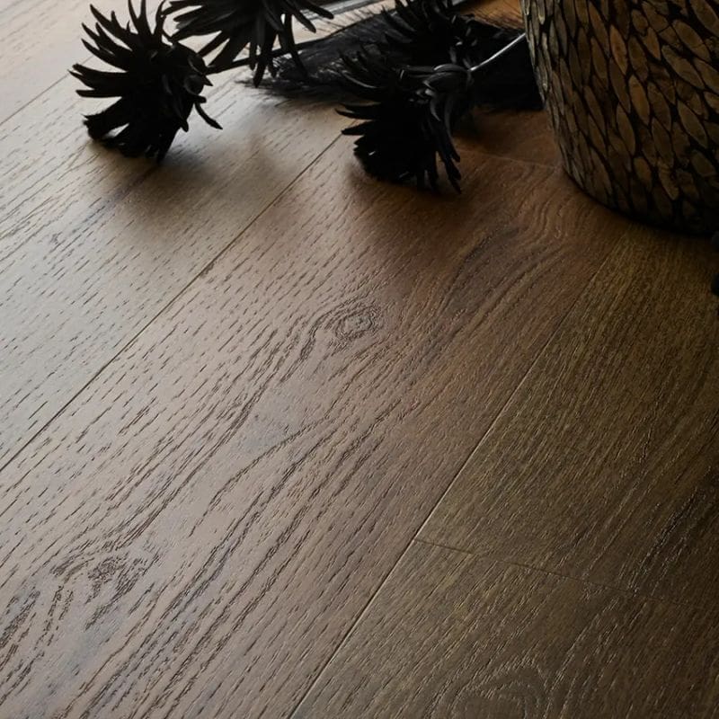 Textures aged oak plank flooring with decorative items showing installed appearance