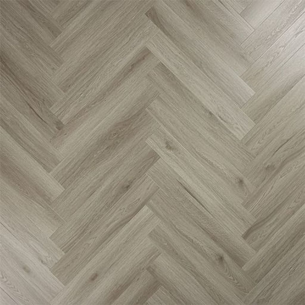 Abingdon Artisan Dryback Urban Grey luxury vinyl flooring laid in a herringbone pattern