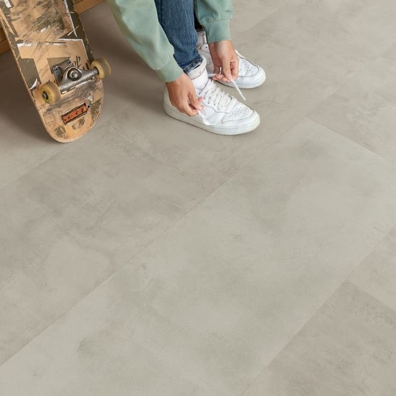 Transition between Quick-Step Grey Concrete Laminate and wooden flooring with curtains