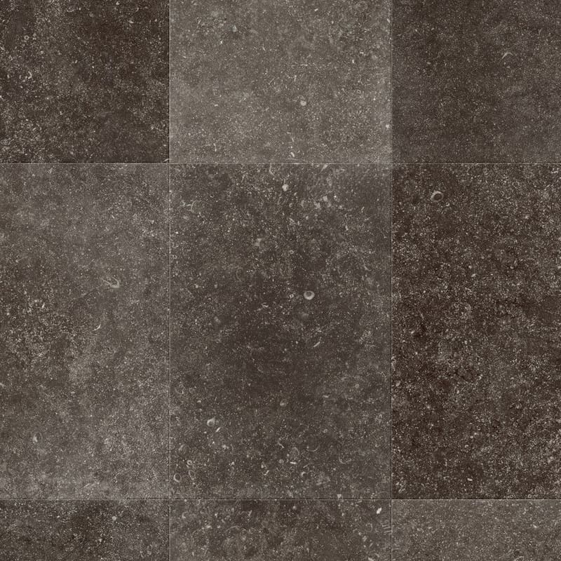 Quick-Step Muse Fumed Bluestone laminate flooring installed in a modern kitchen with wooden cabinetry
