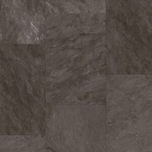 Close-up of Quick-Step Muse Grey Slate Laminate flooring showing natural variations