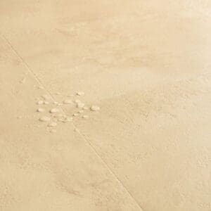 Detailed view of Quick-Step Muse Sandstone laminate flooring texture and authentic stone appearance