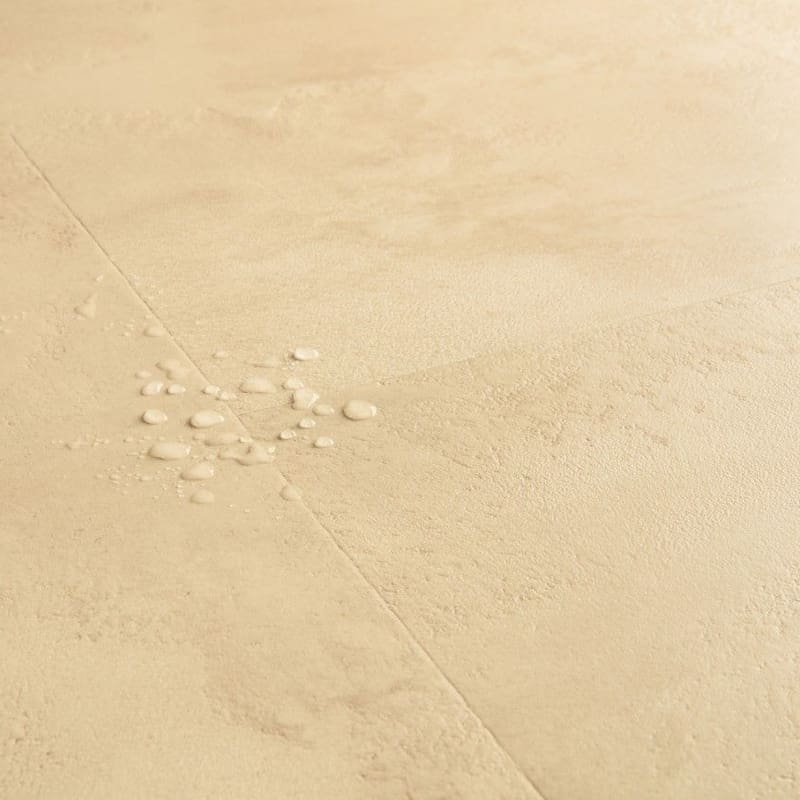 Detailed view of Quick-Step Muse Sandstone laminate flooring texture and authentic stone appearance