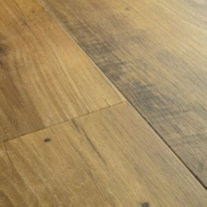 Close-up detail of Quick-Step Alpha Blos Vintage Chestnut Natural vinyl flooring showing textured surface and plank joints