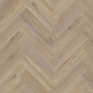 Moduleo Roots Galtymore Oak 86851 luxury vinyl flooring in herringbone pattern showcasing the same warm beige oak finish in a decorative layout