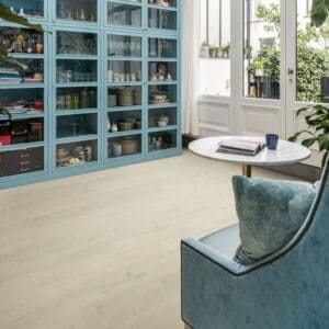 Elegant bathroom with freestanding tub and Soft Patina Oak laminate flooring