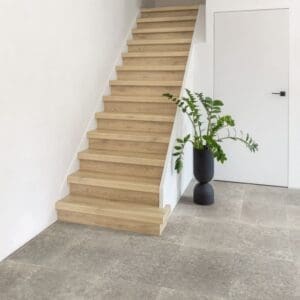 Dog drinking from bowl on Dusky Bluestone laminate flooring showing durability