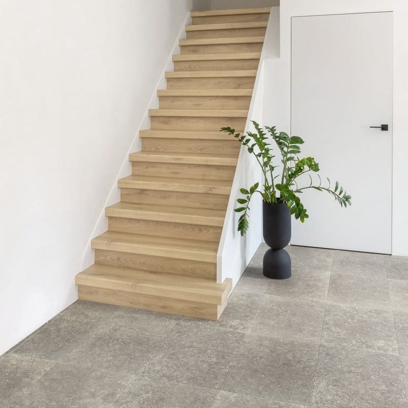 Dog drinking from bowl on Dusky Bluestone laminate flooring showing durability